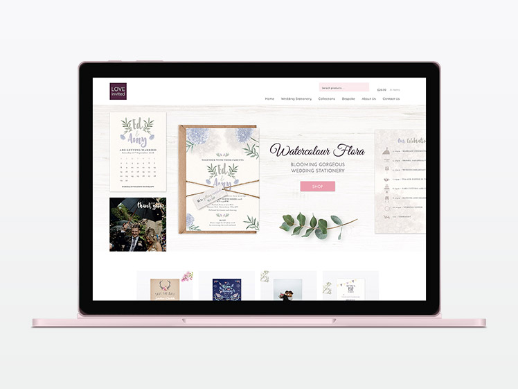 Love Invited website design on a laptop
